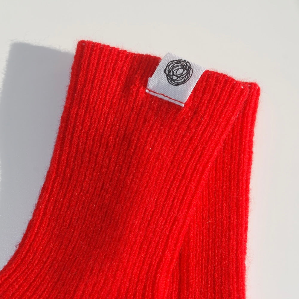 Lille Barn stickad socka - Lava