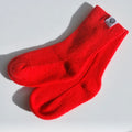 Lille Barn stickad socka - Lava